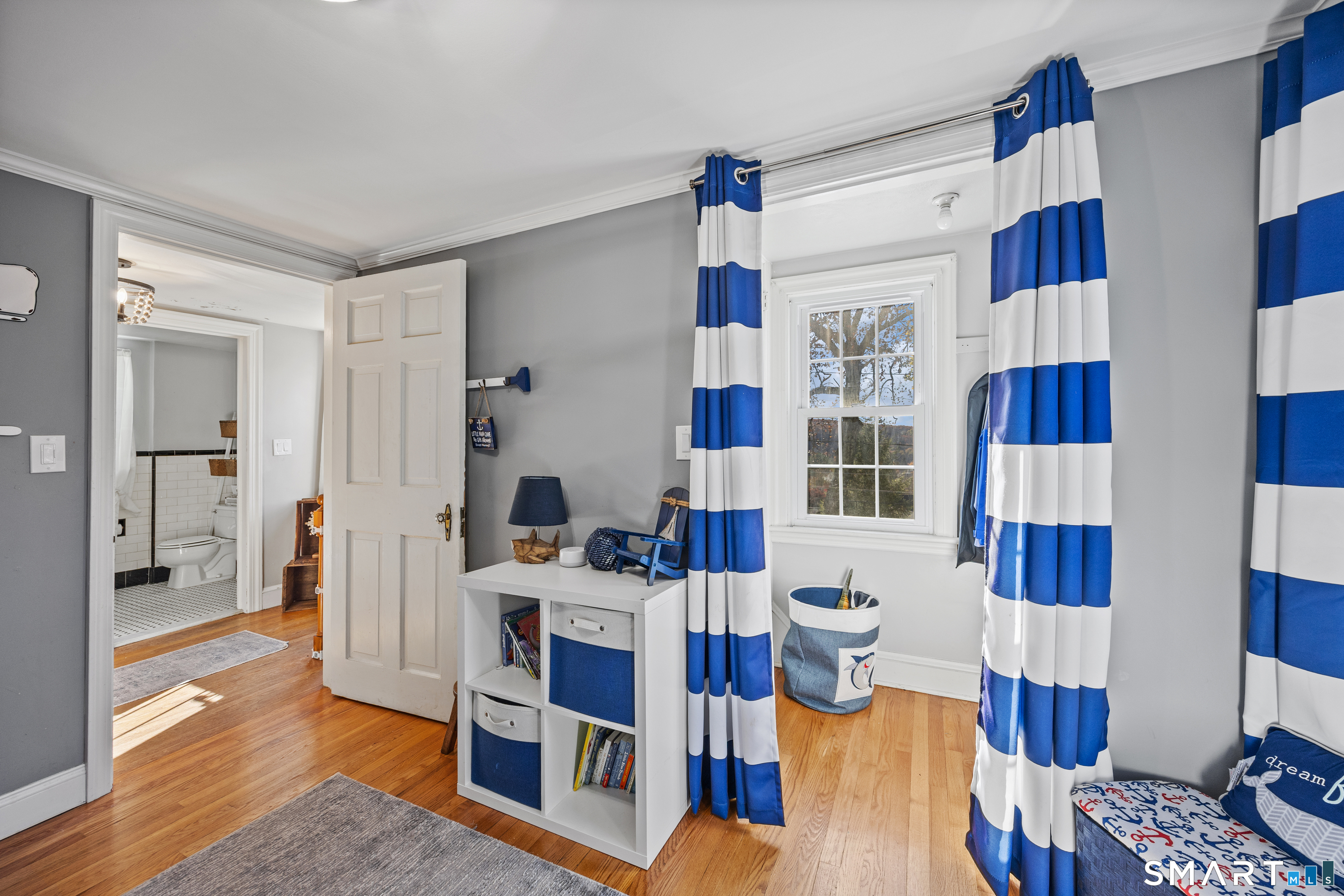232 High Street Thomaston, CT 06787 - Photo 13 of 31 a living room with furniture and a large window