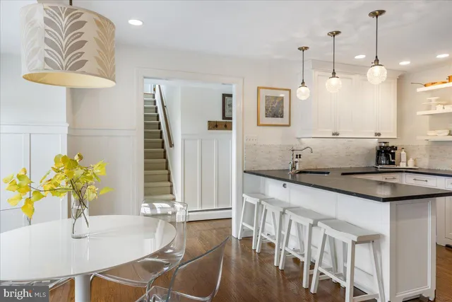 a bedroom with a bed and dresser