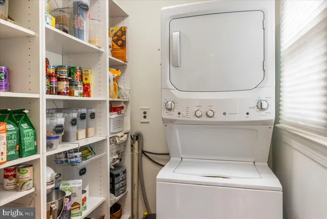 a view of a workspace with furniture and toys