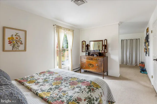 a work place with furniture and flat screen tv