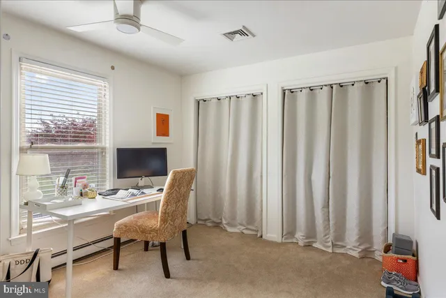a kitchen with stainless steel appliances granite countertop a stove and cabinets