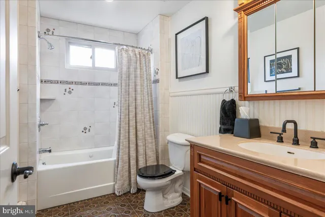 a view of balcony with chairs and umbrella