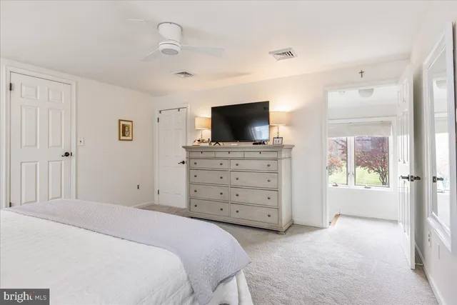 a aerial view of a house with a yard basket ball court