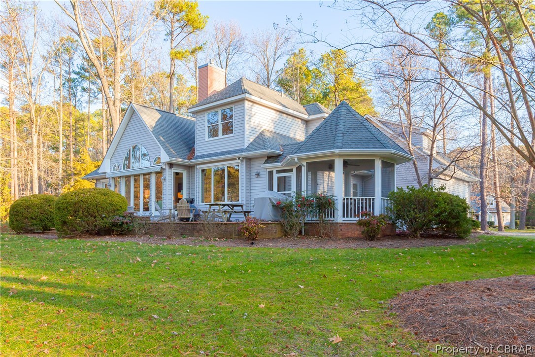 194 Oyster House Road White Stone, VA 22578 - Photo 6 of 50 Side view of home, lawn and screened porch