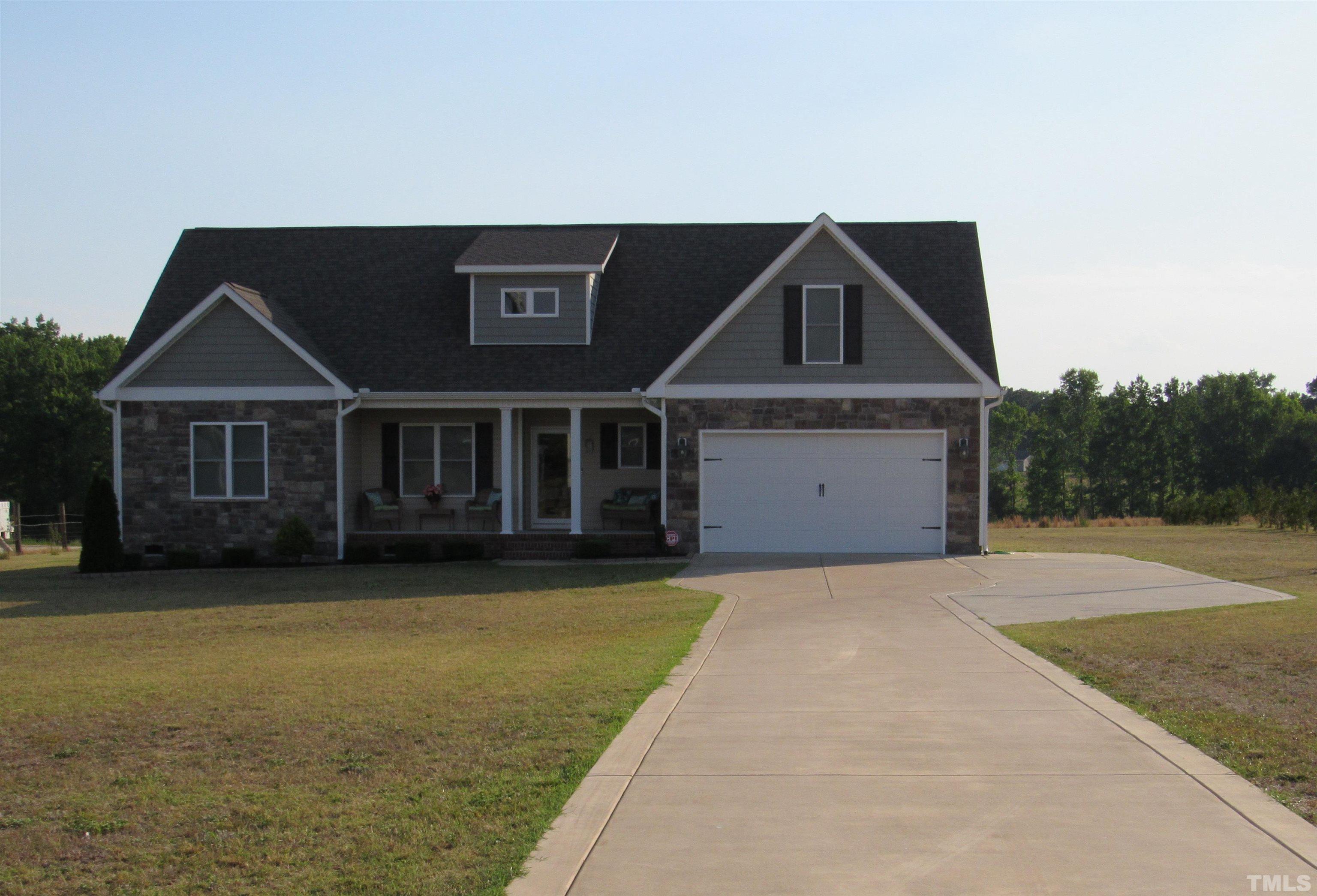 3167 Baileys Crossroads Road Benson, NC 27504 - Photo 1 of 29 a front view of a house with a yard
