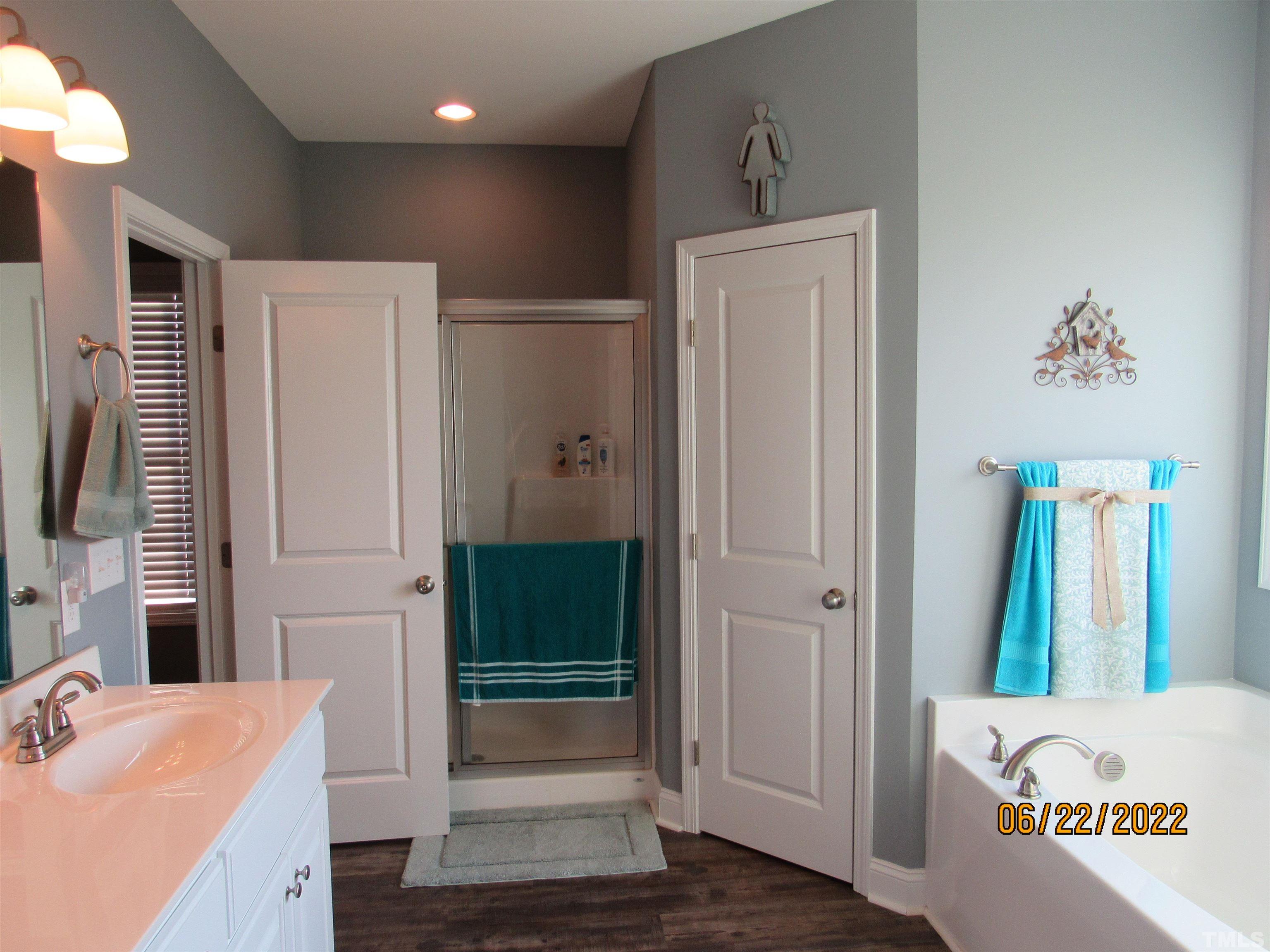 3167 Baileys Crossroads Road Benson, NC 27504 - Photo 6 of 29 a hallway with a door open kitchen view
