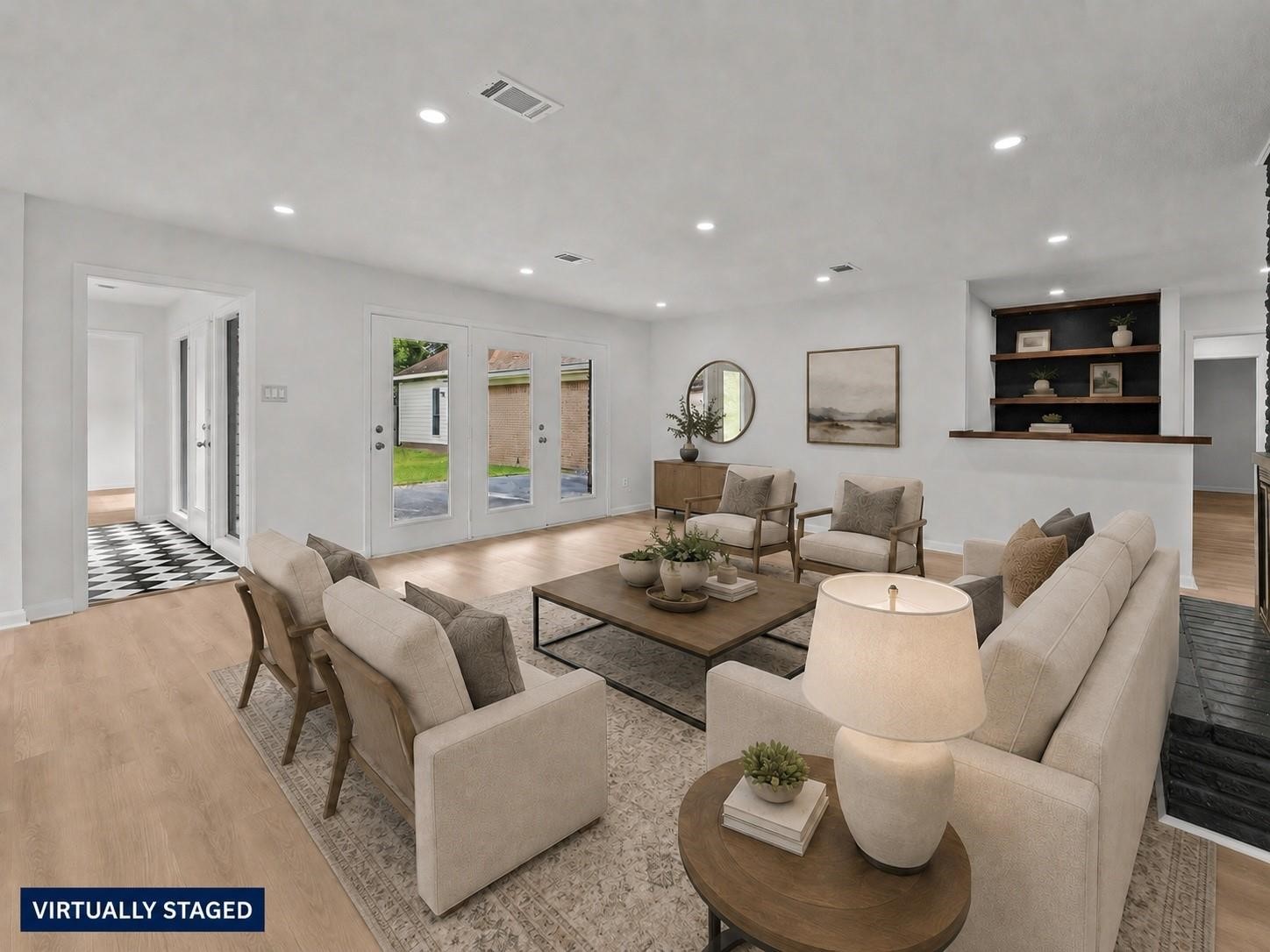 5762 Birdwood Road Houston, TX 77096 - Photo 12 of 49 THE EXPANSIVE FAMILY ROOM AS VIEWED FROM THE KITCHEN AREA.