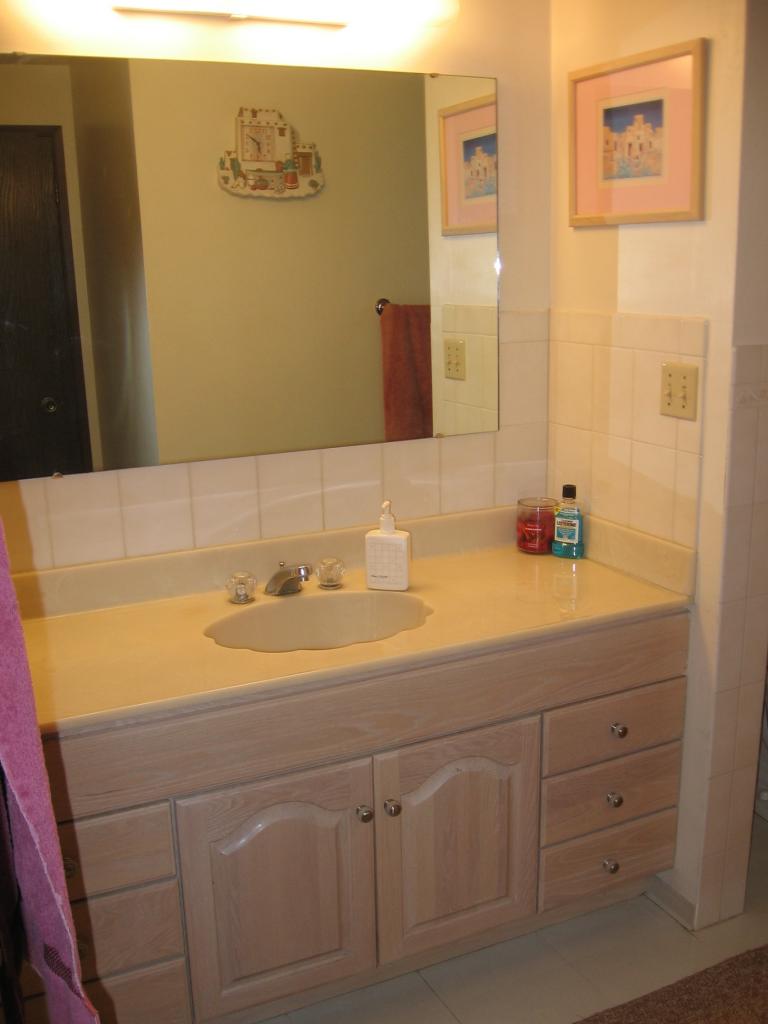 2411 Lateral 1 Road Wapato, WA 98951 - Photo 5 of 12 a bathroom with a sink and a mirror