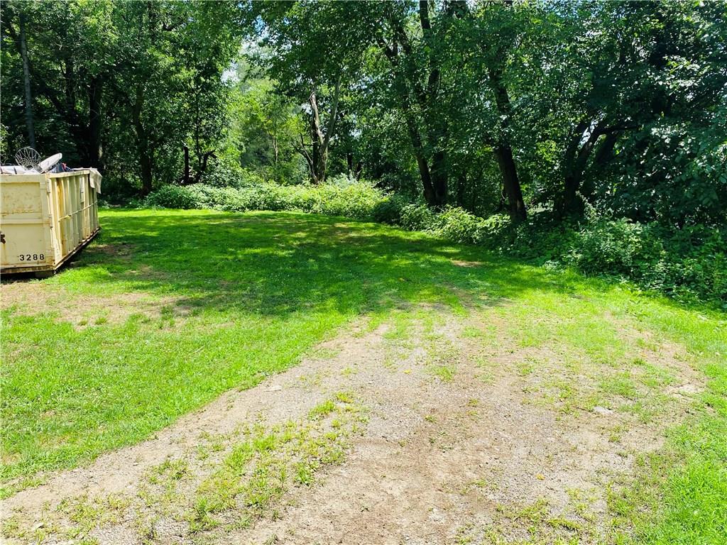 1127 Lapish Road Pittsburgh, PA 15212 - Photo 19 of 23 Back yard and dirt/gravel driveway.