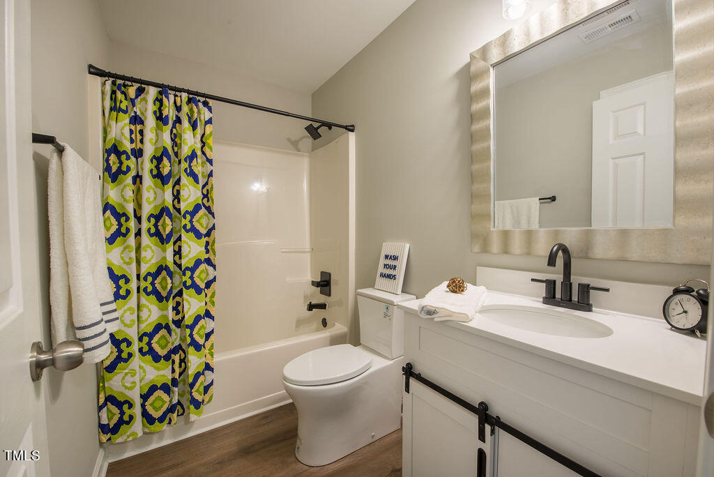 8728 Compass Lane Raleigh, NC 27615 - Photo 14 of 17 Guest bathroom