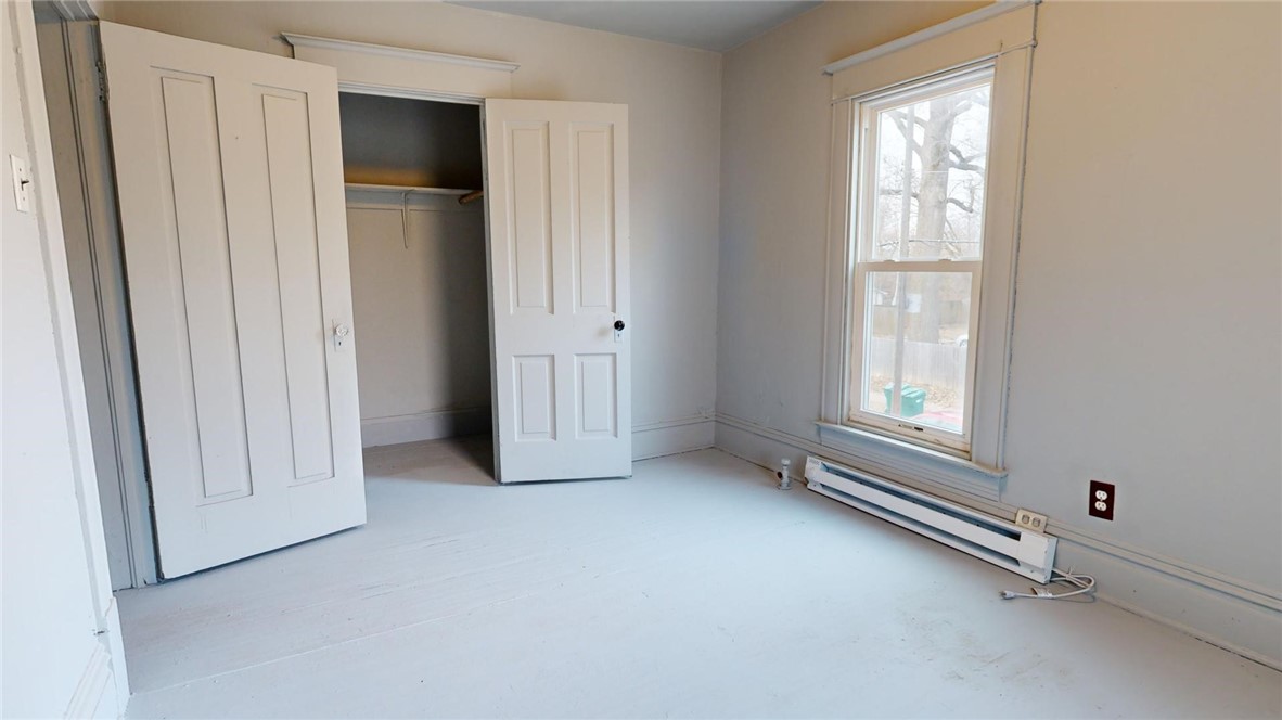 501 South Crea Street Decatur, IL 62522 - Photo 5 of 34 an empty room with windows