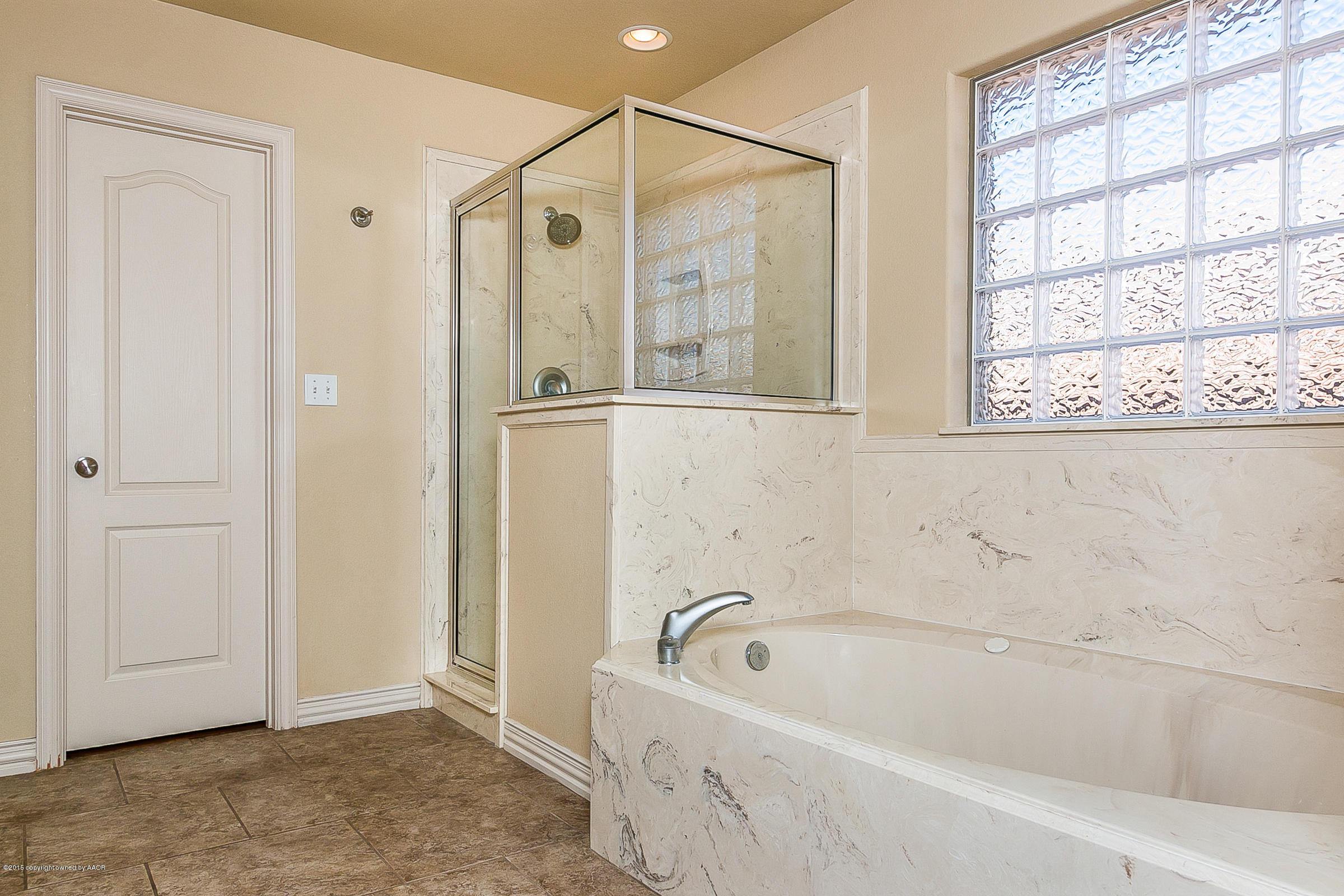 6909 Thunder Road Amarillo, TX 79119 - Photo 16 of 28 017_Master Bath and Shower .jpg
