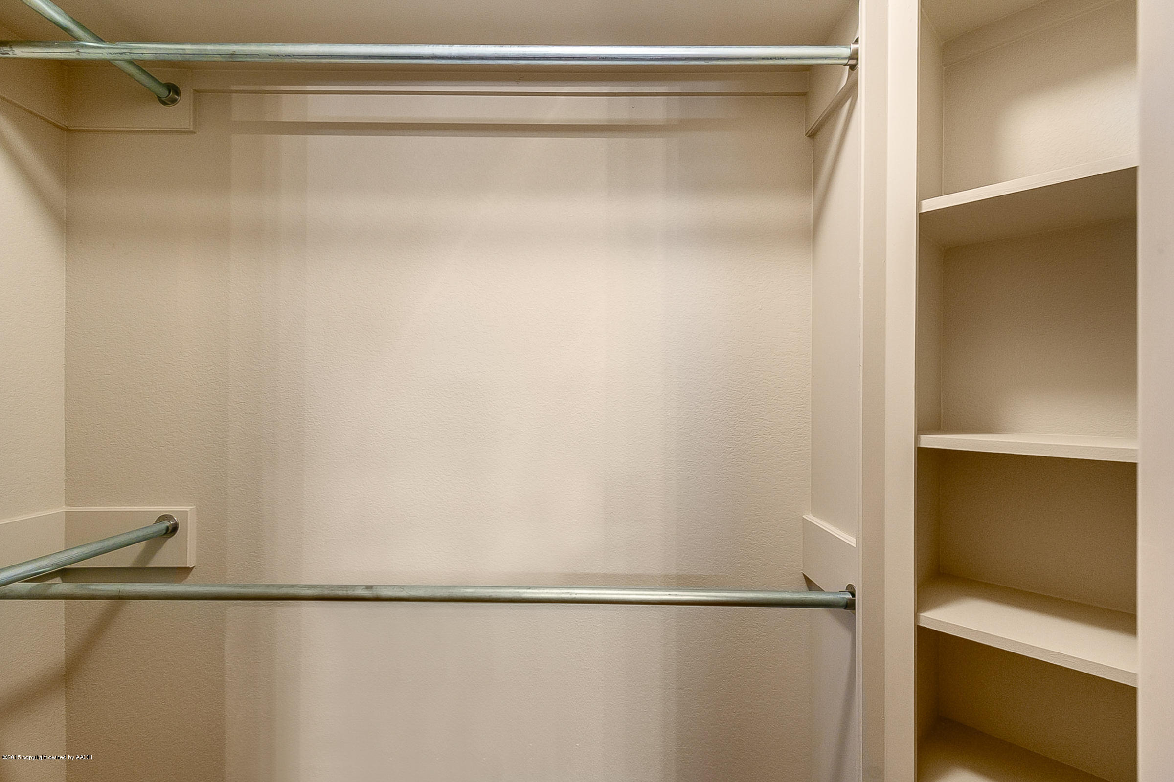6909 Thunder Road Amarillo, TX 79119 - Photo 18 of 28 022_Bedroom Closet.jpg