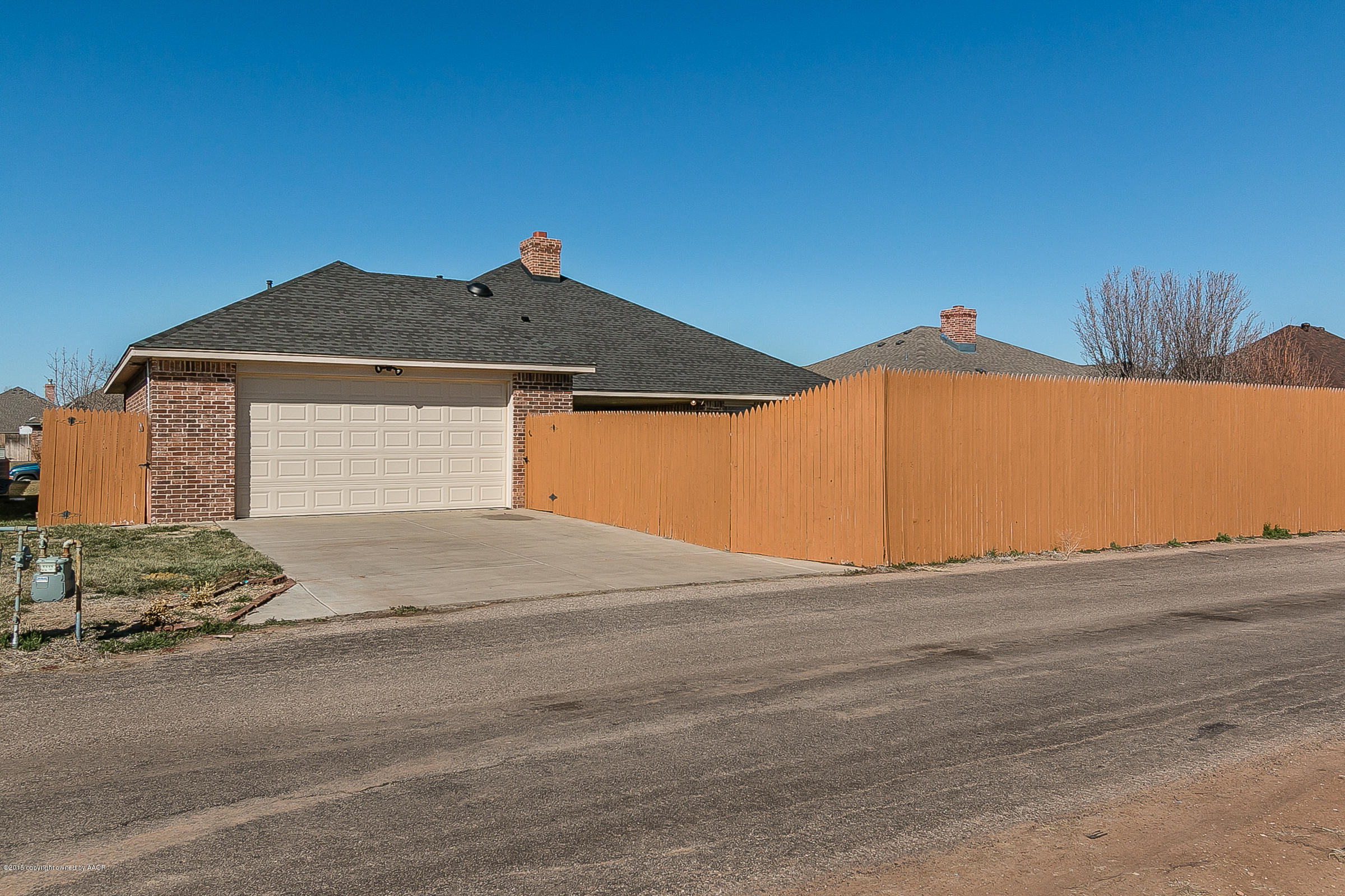 6909 Thunder Road Amarillo, TX 79119 - Photo 25 of 28 028_Garage and Driveway.jpg