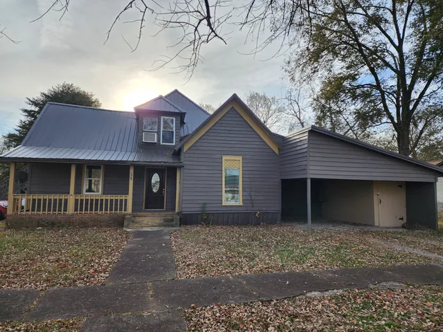 a house view with a garden space