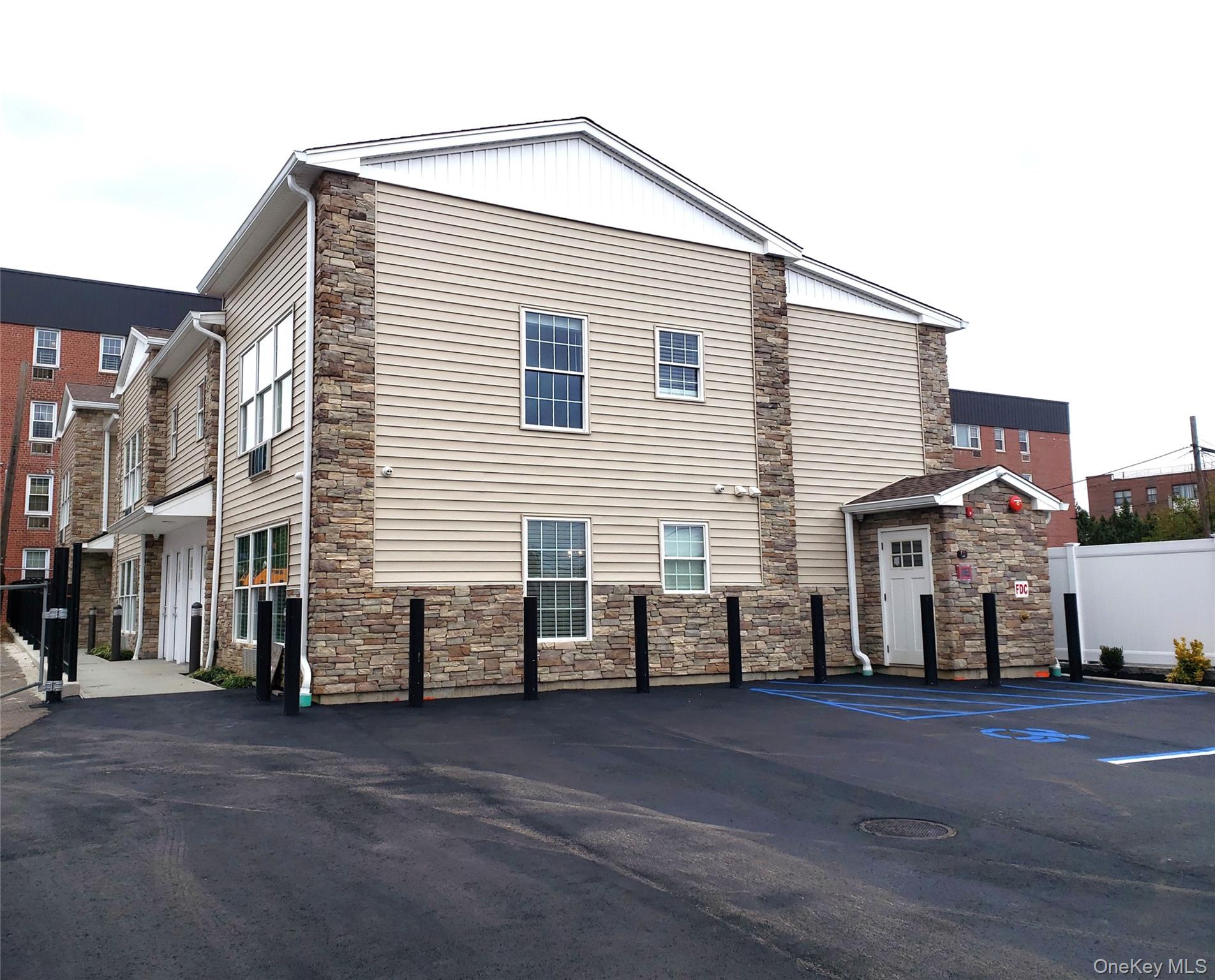 a view of a house with a street