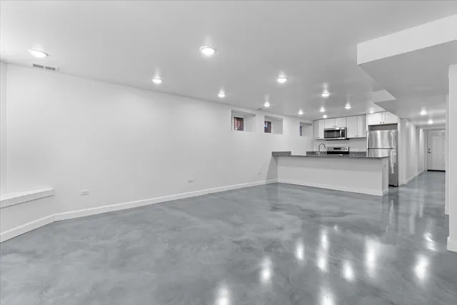 a view of a kitchen with a sink