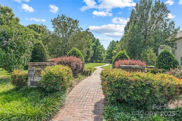 a view of a garden with an outdoor space