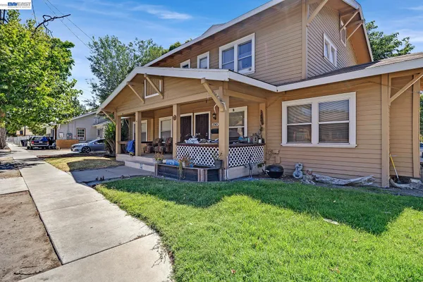 a view of a house with a patio