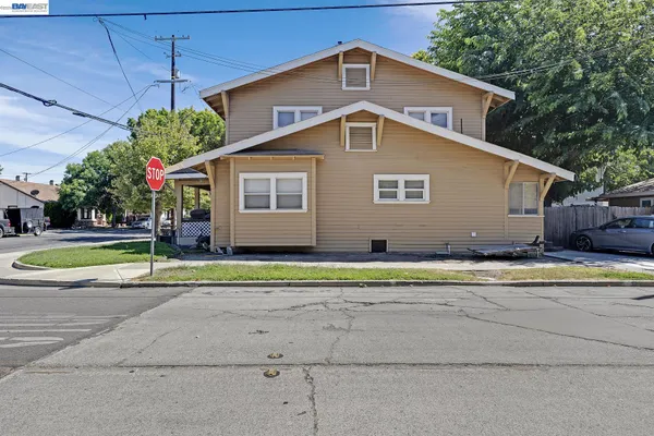 a view of a street with cars