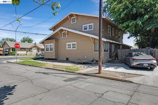 a car parked in front of a house