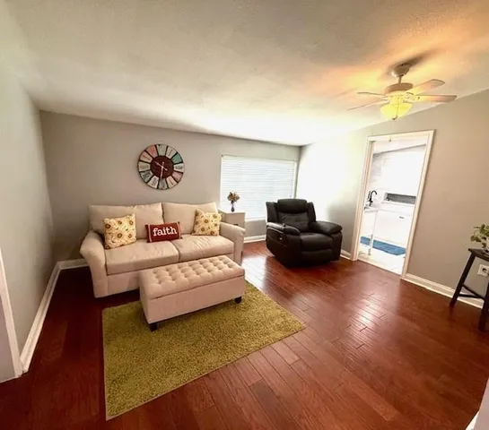 a kitchen with granite countertop a stove top oven and sink