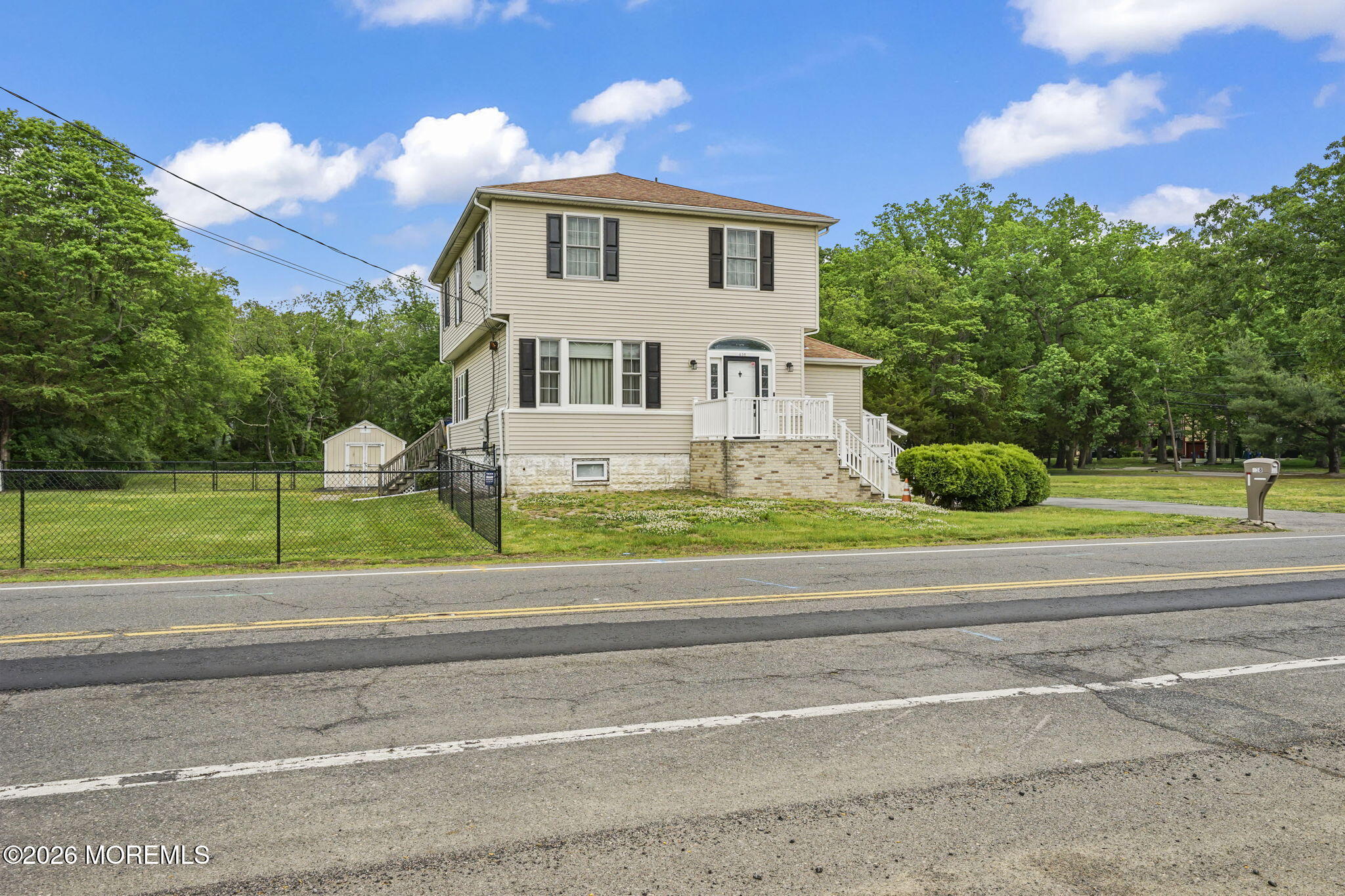 438 Bennetts Mills Road Jackson, NJ 08527 - Photo 42 of 42 a view of a house with a yard and large trees
