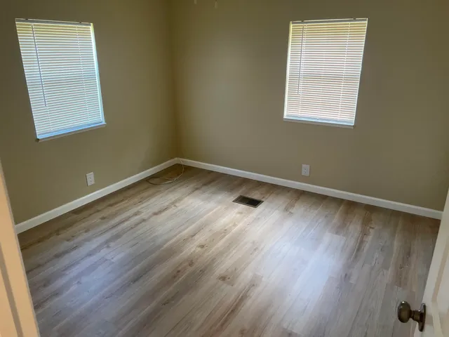 a view of a car in front of a house