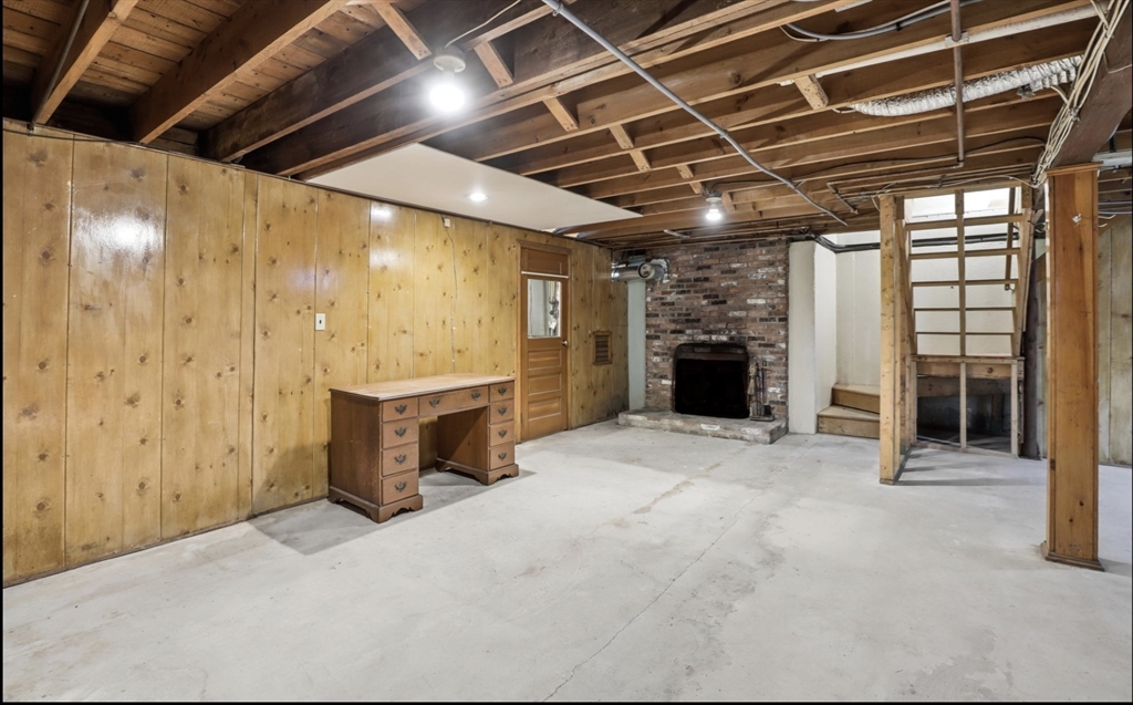 49 Jackson Road Scituate, MA 02066 - Photo 20 of 25 a view of a livingroom with a fireplace