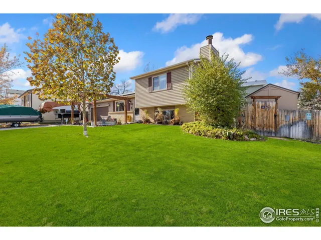 a view of a house with a big yard