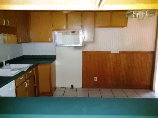 304 South Alpine Road Rockford, IL 61108 - Photo 4 of 6 a kitchen with a sink and a cabinets