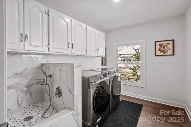 a utility room with dryer and washer