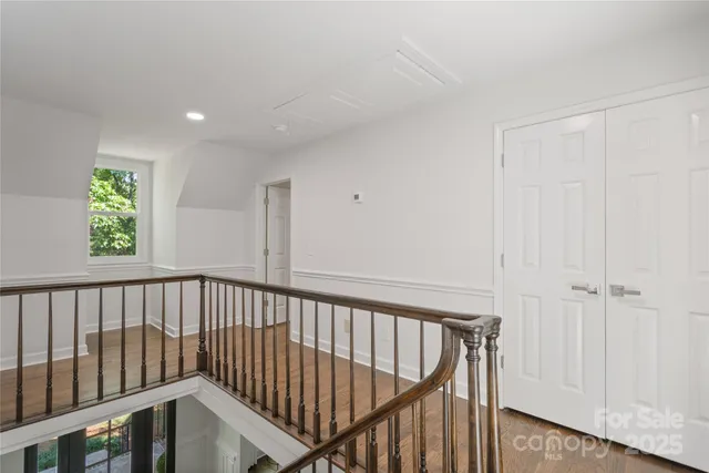 a bathroom with a double vanity sink and mirror