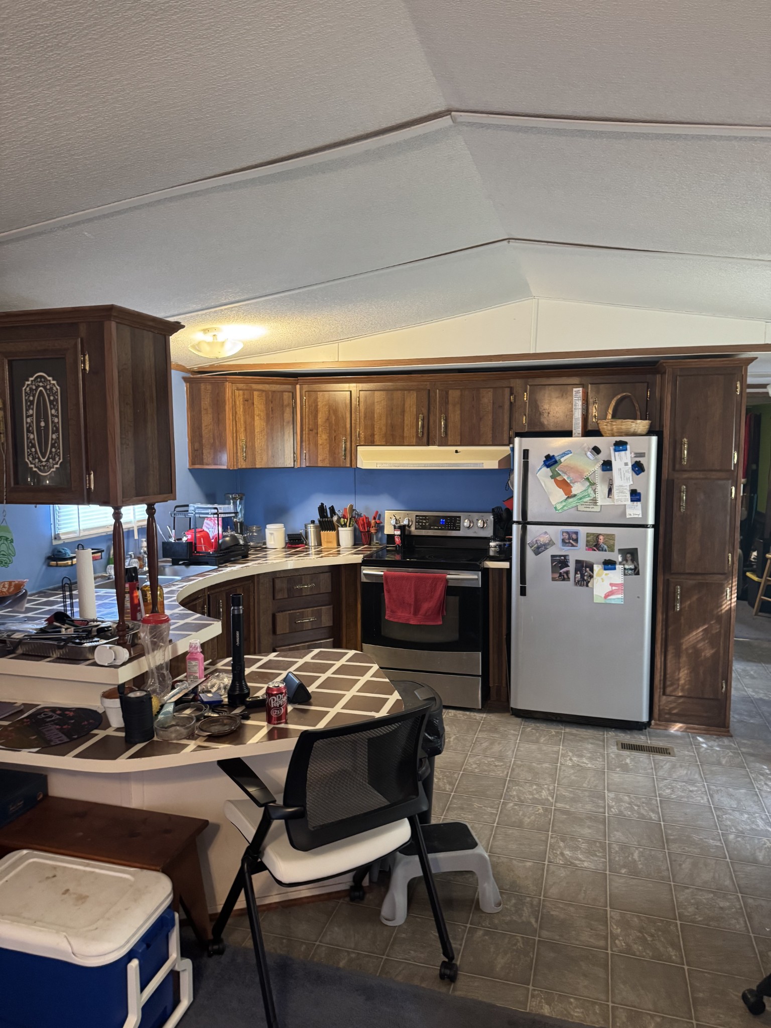 3020 West County Farm Road Springfield, TN 37172 - Photo 8 of 10 a kitchen with a stove and a refrigerator