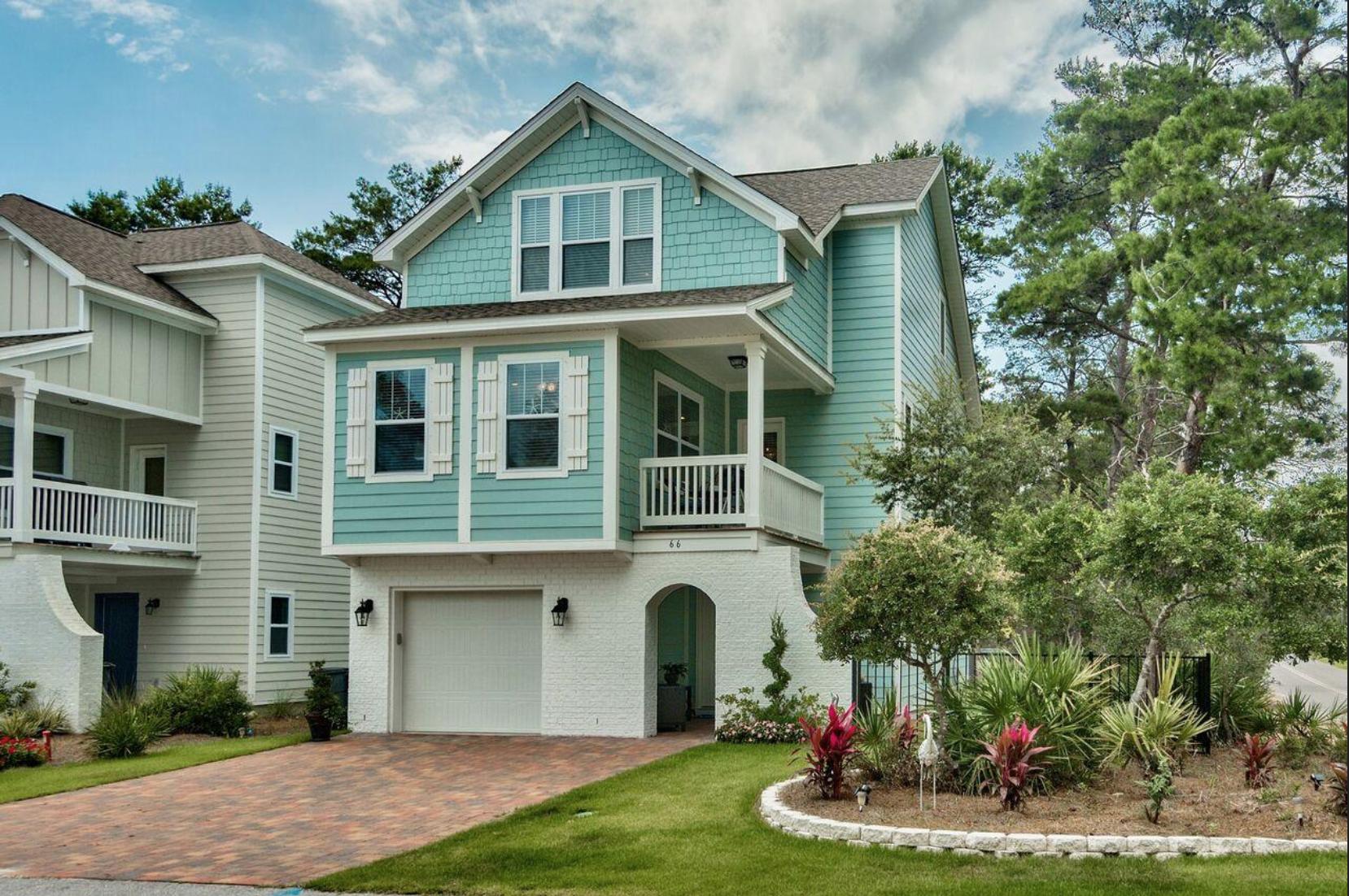 66 Sandpine Loop Inlet Beach, FL 32461 - Photo 1 of 41 a front view of a house with a yard