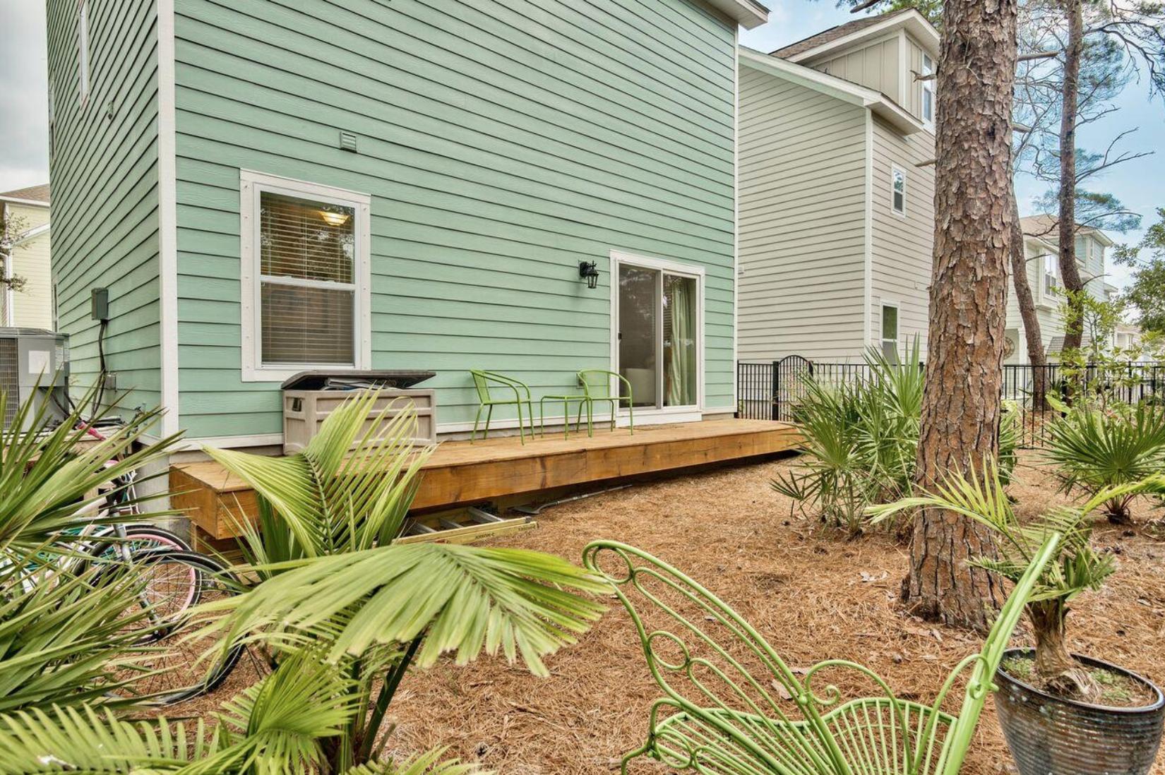66 Sandpine Loop Inlet Beach, FL 32461 - Photo 18 of 41 a view of backyard with swimming pool and outdoor seating