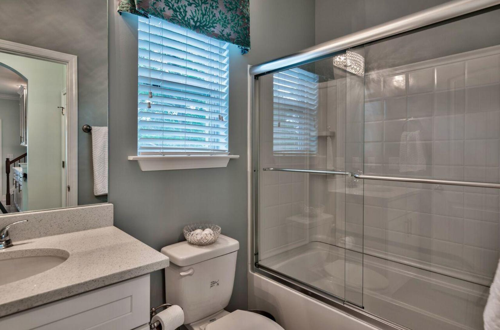 66 Sandpine Loop Inlet Beach, FL 32461 - Photo 20 of 41 a bathroom with a granite countertop sink toilet and shower