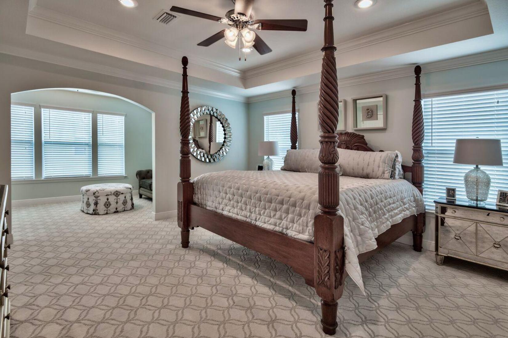 66 Sandpine Loop Inlet Beach, FL 32461 - Photo 23 of 41 a bedroom with bed and a chandelier