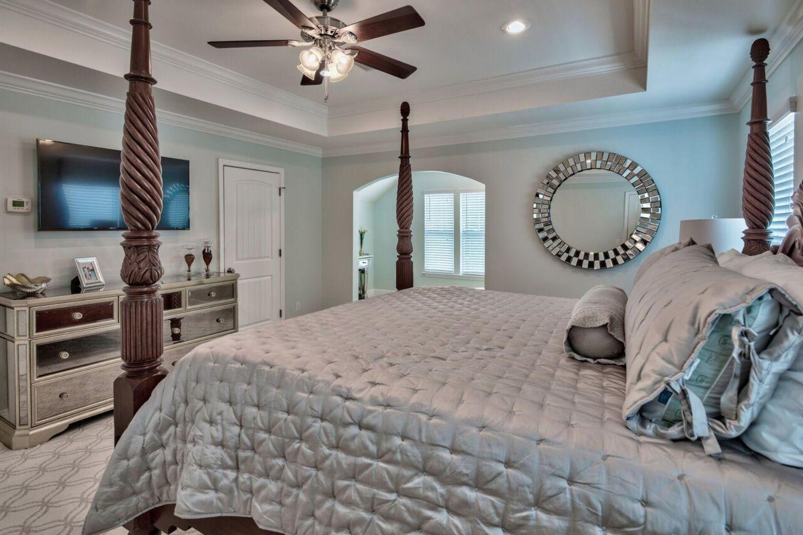 66 Sandpine Loop Inlet Beach, FL 32461 - Photo 24 of 41 a bedroom with a bed and a flat screen tv
