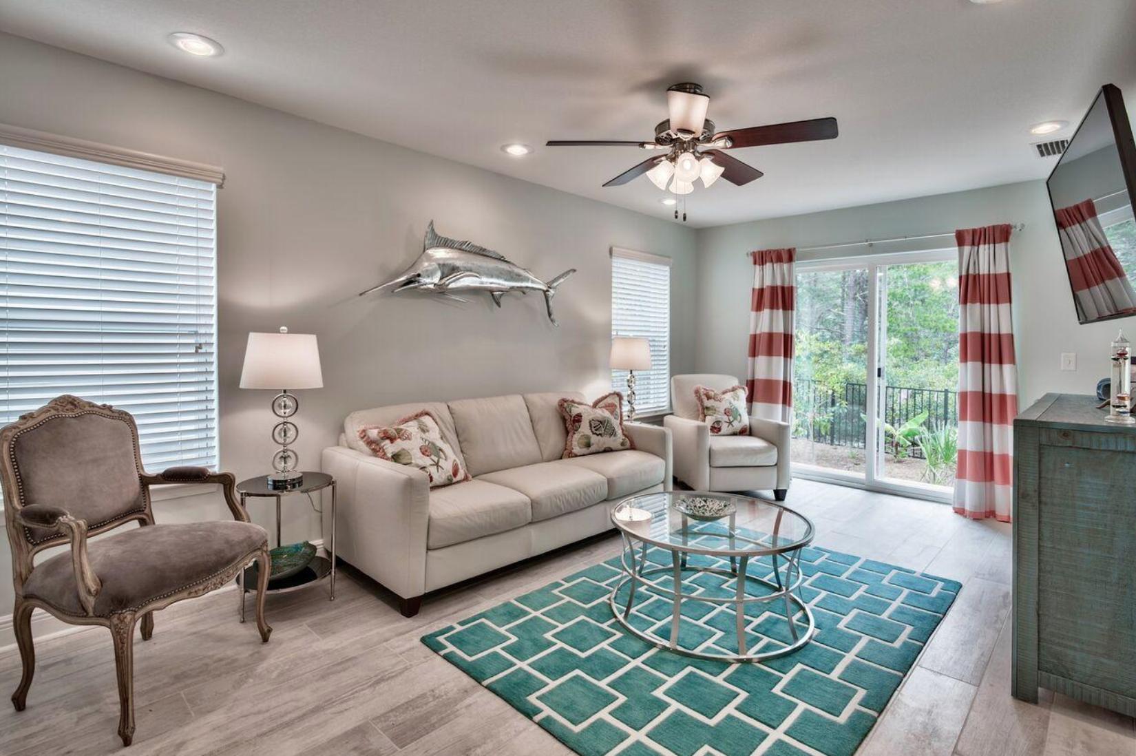 66 Sandpine Loop Inlet Beach, FL 32461 - Photo 32 of 41 a living room with furniture and a large window