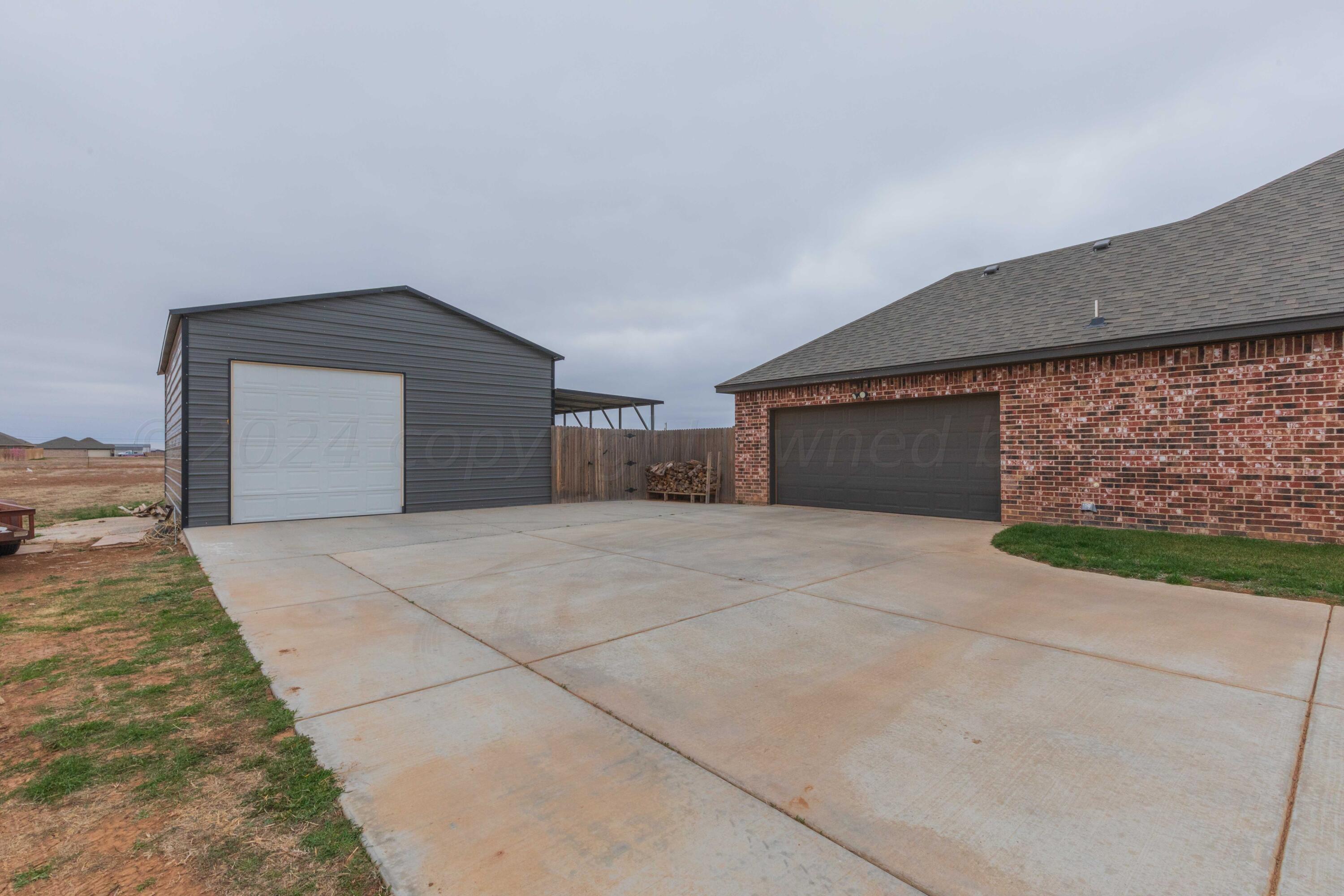 9634 Remington Road Canyon, TX 79015 - Photo 34 of 40 GARAGE VIEW 1