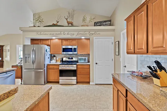 a kitchen with lots of counter top space and a sink