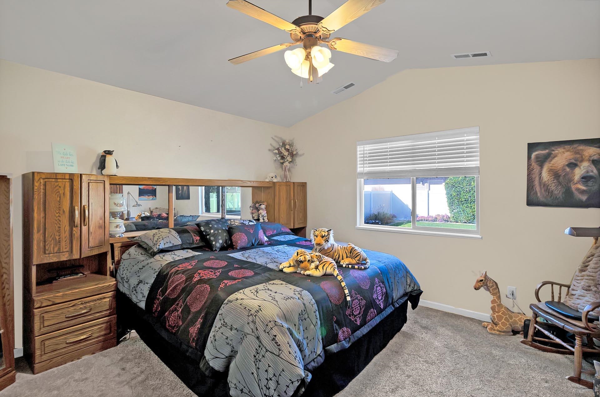 247 Mason Ridge Drive Grand Junction, CO 81503 - Photo 24 of 40 a bedroom with bed and a window