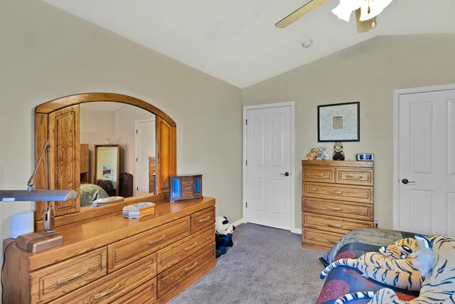 a bathroom with a tub and a window