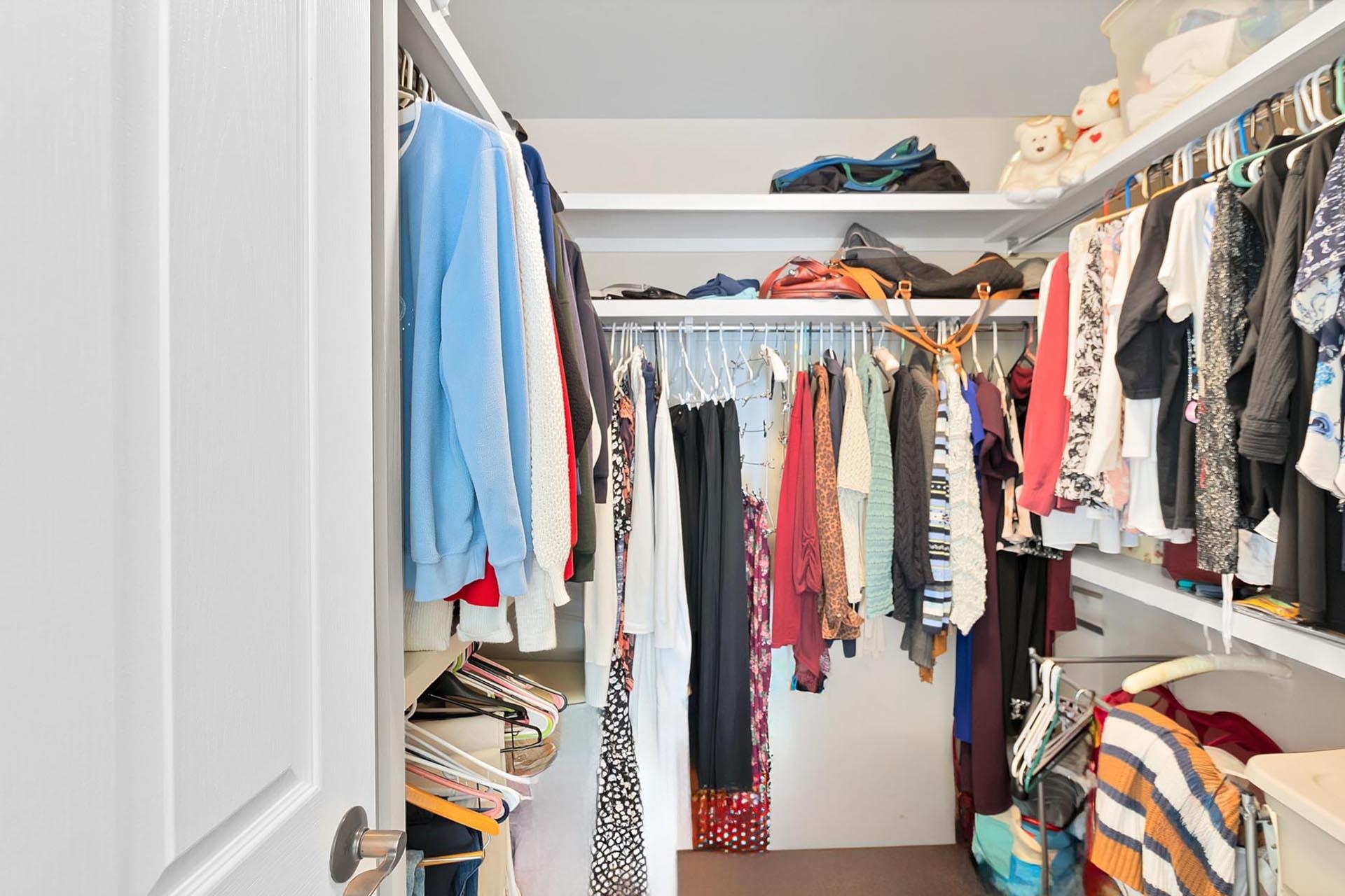 247 Mason Ridge Drive Grand Junction, CO 81503 - Photo 29 of 40 a view of walk in closet with clothes and shoes