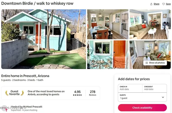 a black and white photo of a house