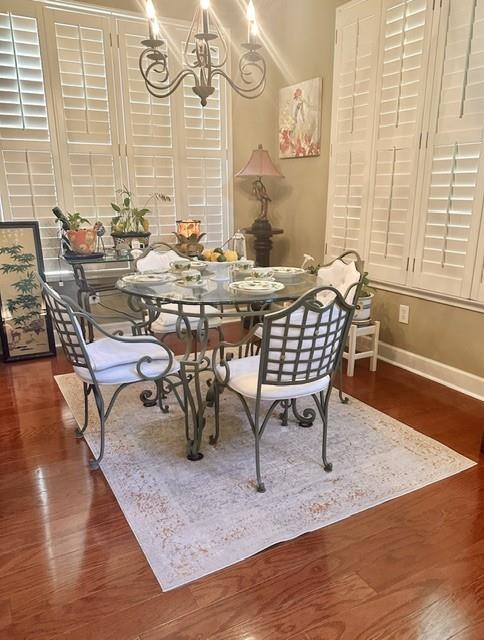 104 Willow Overlook Canton, GA 30115 - Photo 6 of 27 a dining room with furniture and wooden floor