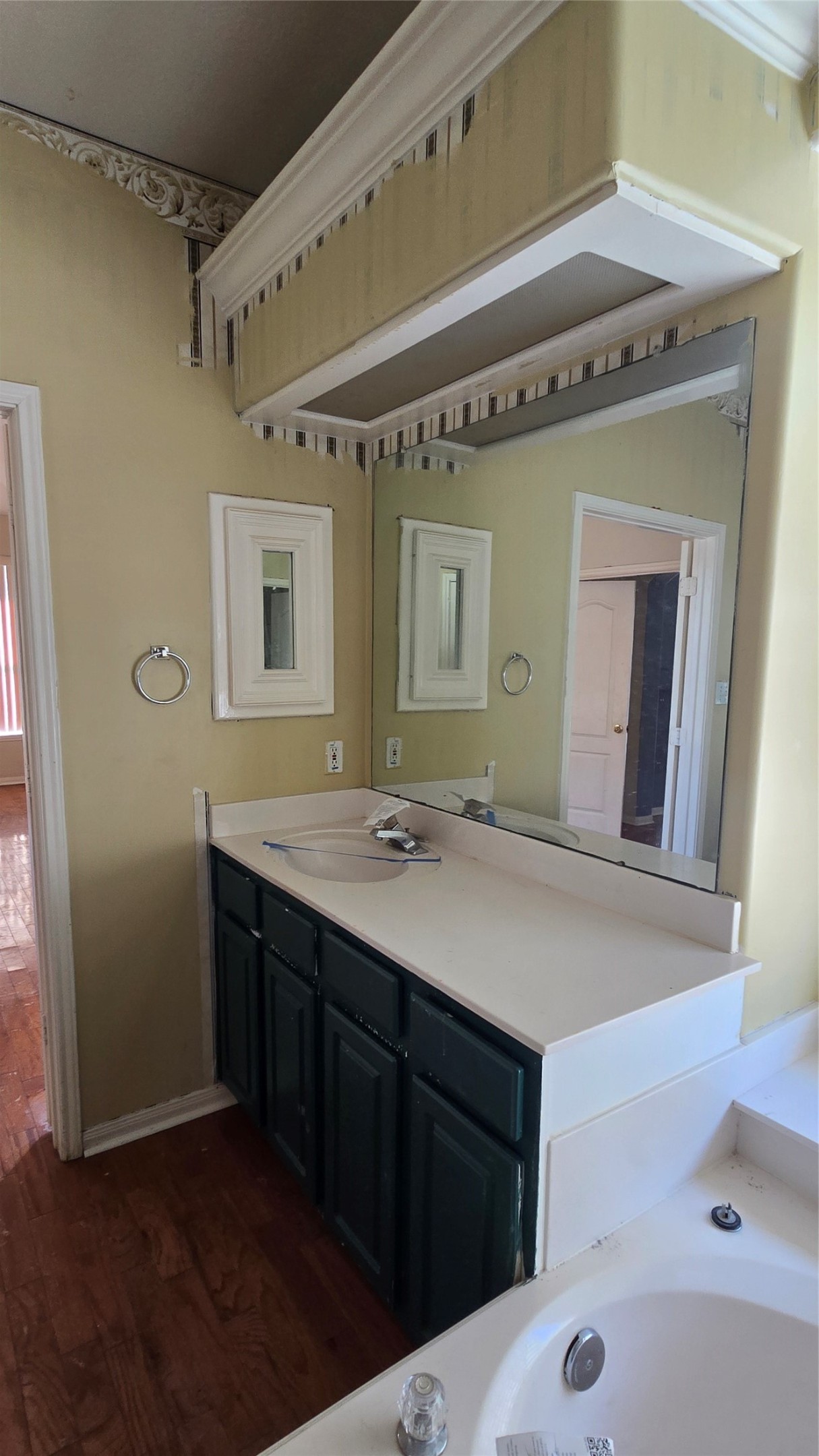 131 Annes Way Stafford, TX 77477 - Photo 14 of 25 a bathroom with a sink and a mirror