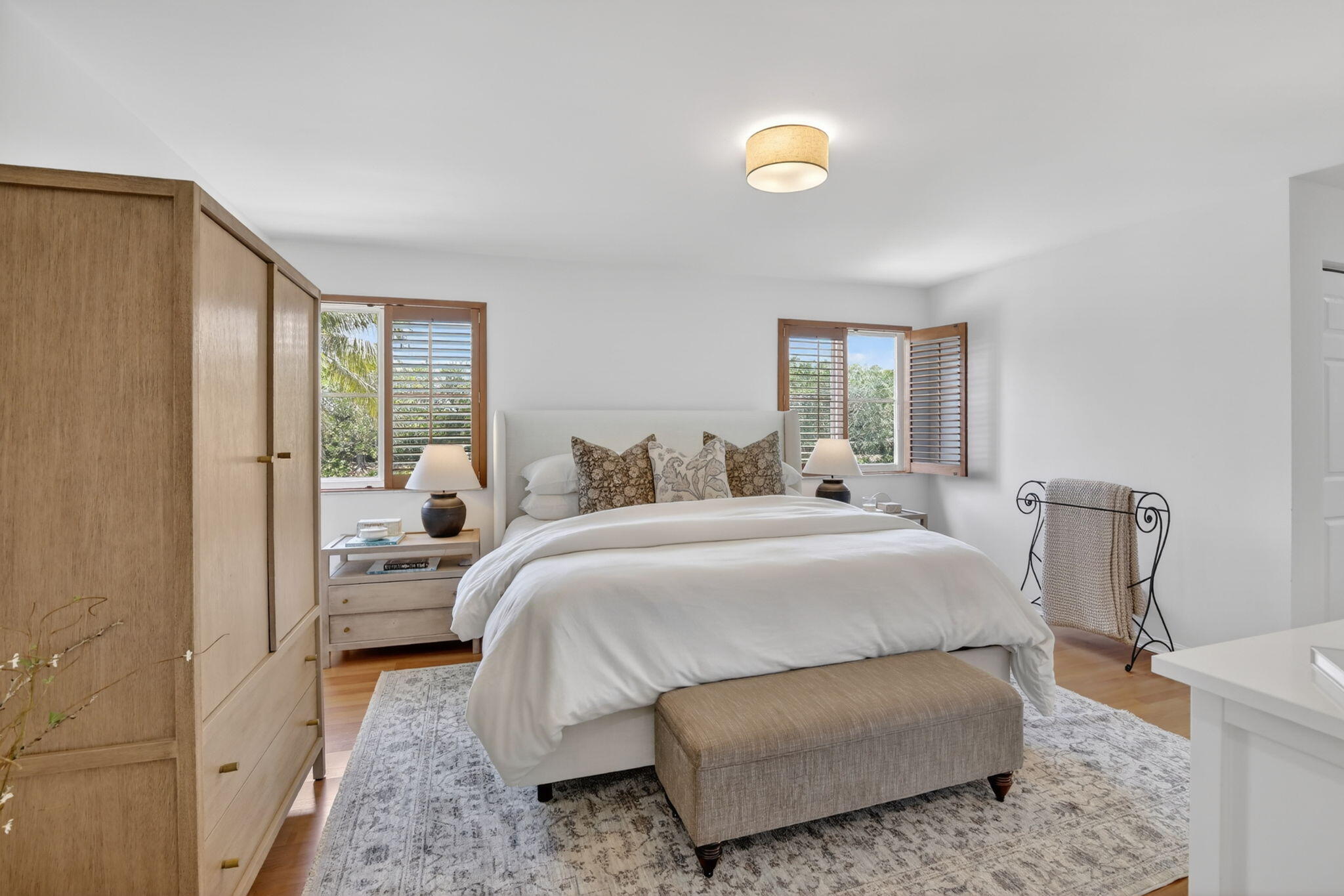 4299 Laurel Ridge Circle Weston, FL 33331 - Photo 49 of 103 a bedroom with a bed and glass window