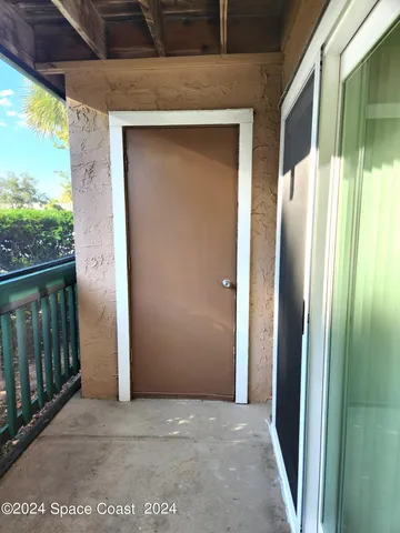 a view of a garden from a balcony